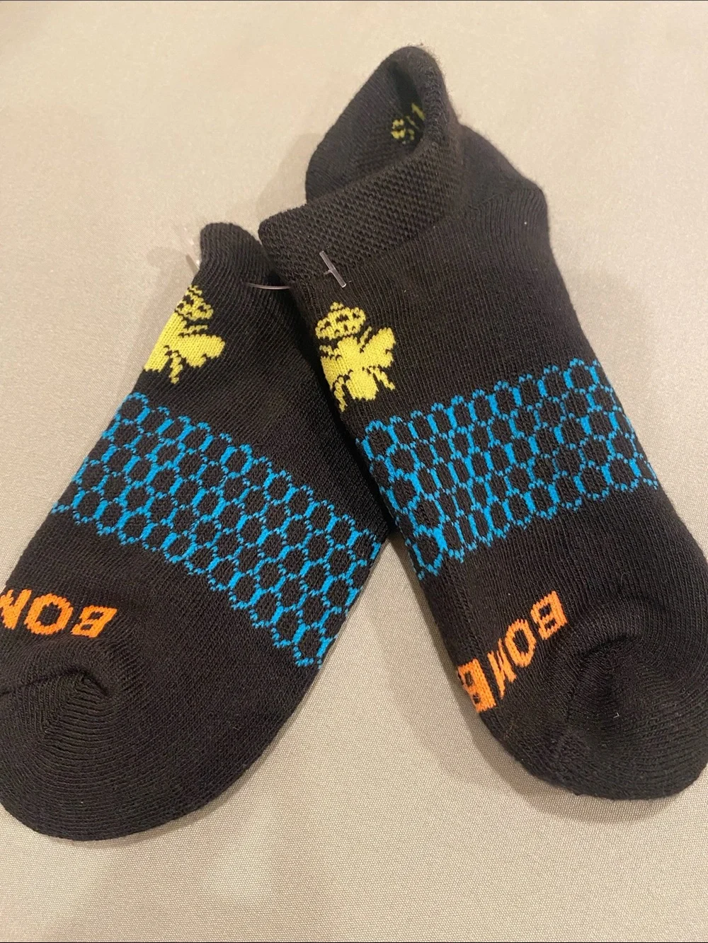 Bombas Black Low-Cut Socks with Blue and Orange Accents